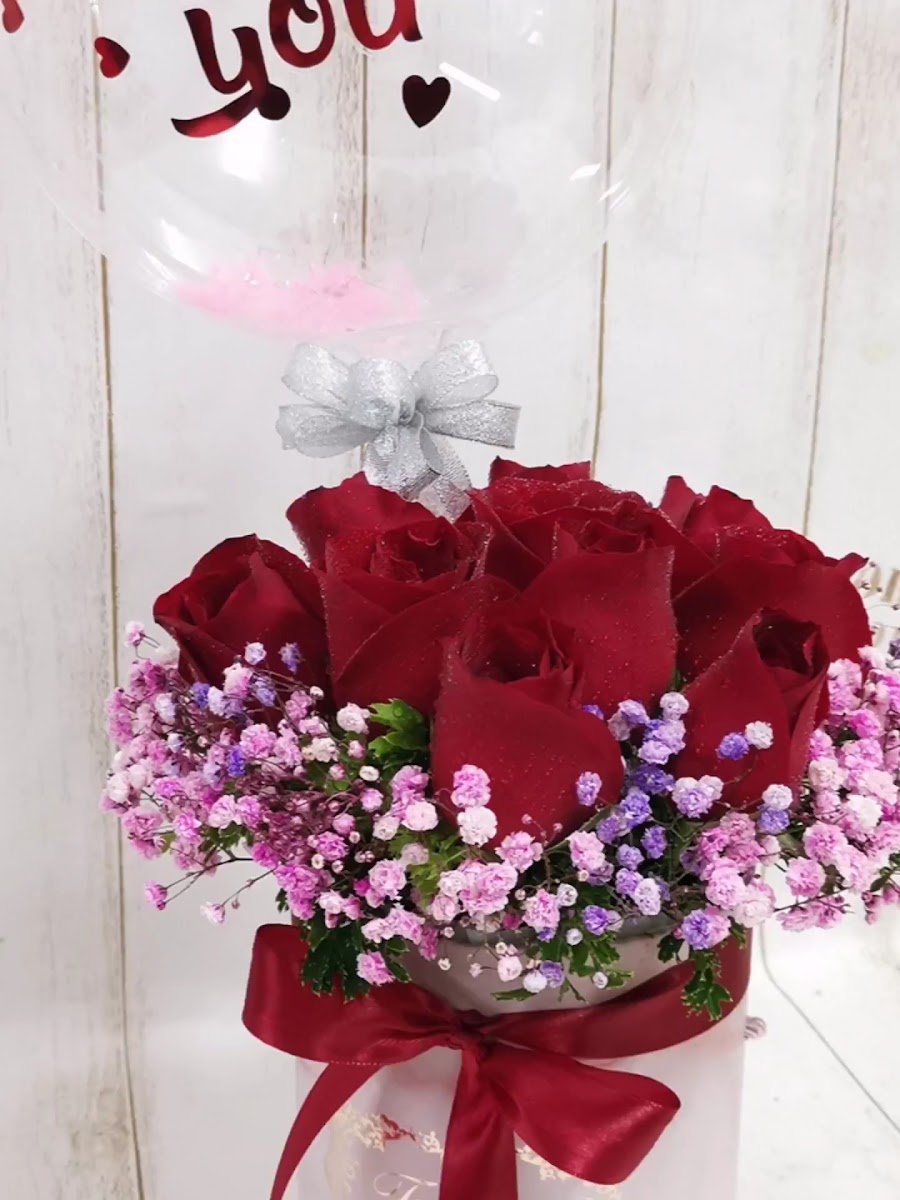 Red rose and baby's breath balloon gift box arrangement